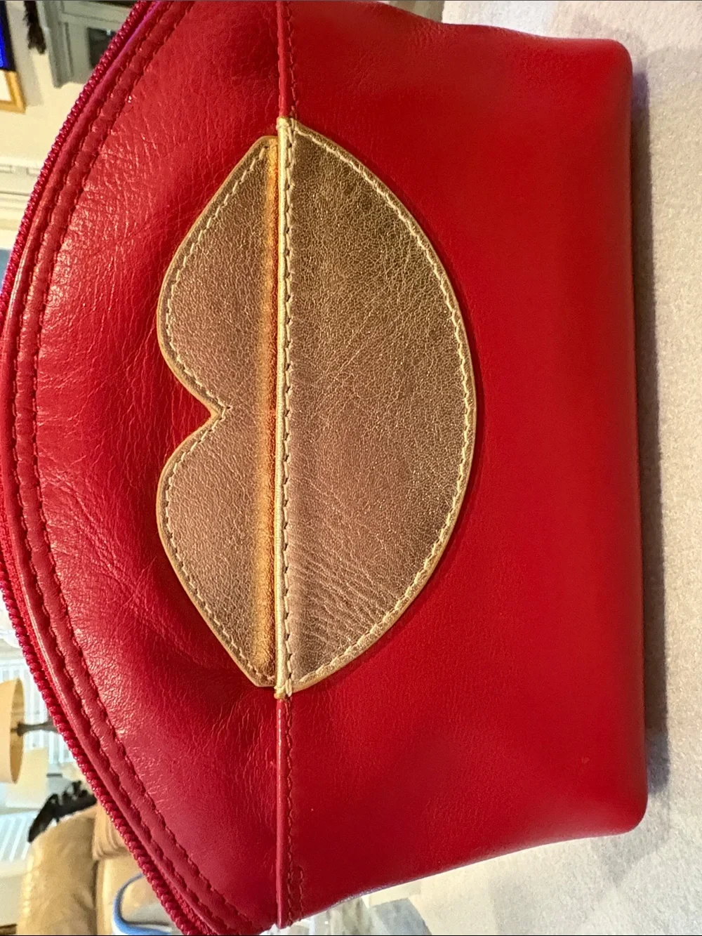 Red Pouch with Gold Lip Accent